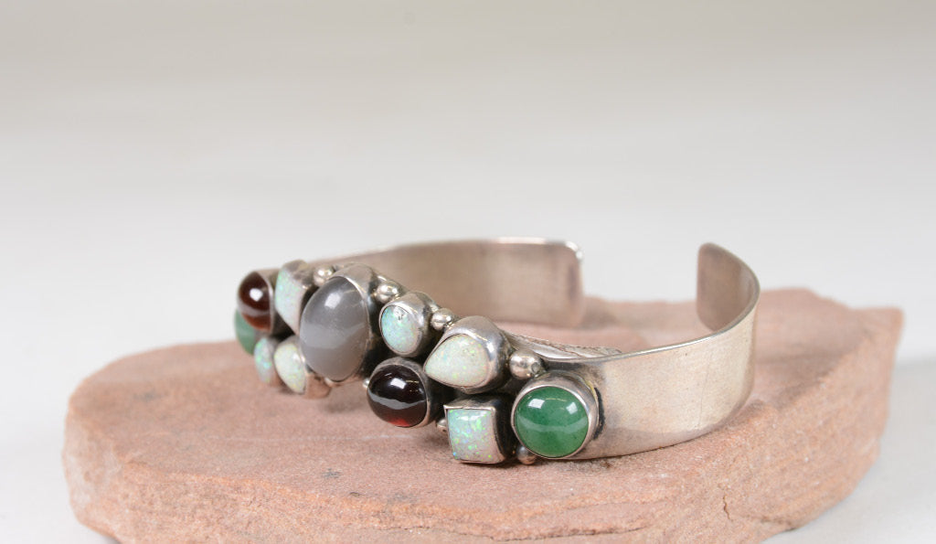 Contemporary Navajo hand made Bracelet with multiple stone settings