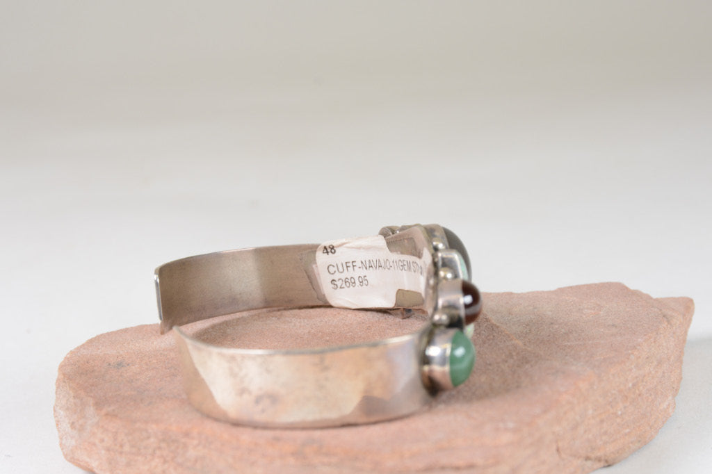 Contemporary Navajo hand made Bracelet with multiple stone settings