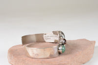 Contemporary Navajo hand made Bracelet with multiple stone settings