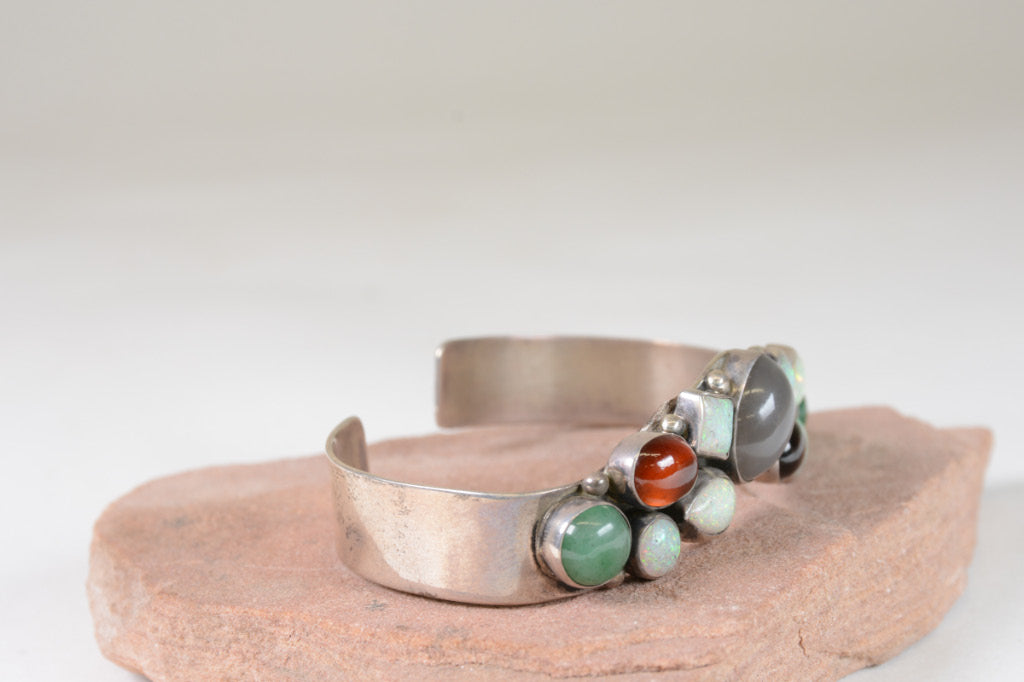 Contemporary Navajo hand made Bracelet with multiple stone settings