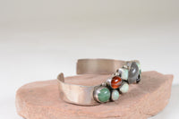 Contemporary Navajo hand made Bracelet with multiple stone settings