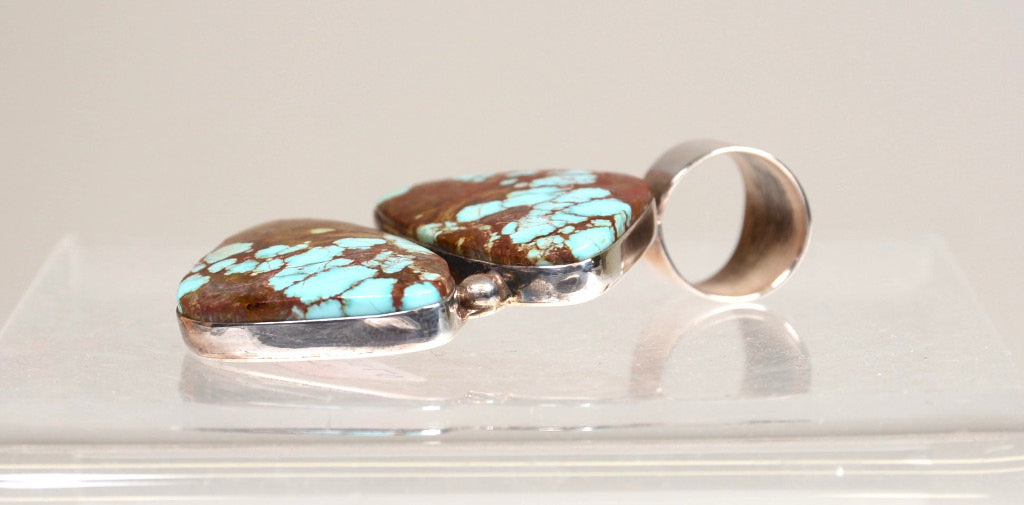Navajo Pendant: Sterling Silver and Two Triangular Roystone NV Turquoise Stones
