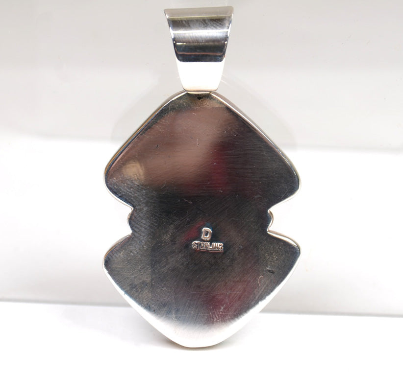 Navajo Pendant: Sterling Silver and Two Triangular Roystone NV Turquoise Stones