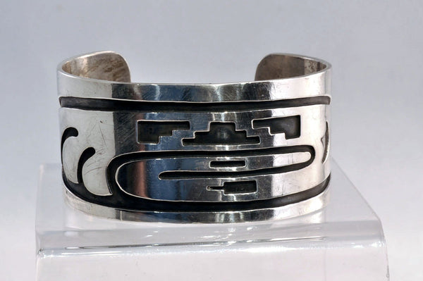 An Early Hopi Sterling Silver Overlay Bracelet, Sikyátki Bird- Dance Wand motif