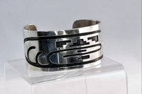 An Early Hopi Sterling Silver Overlay Bracelet, Sikyátki Bird- Dance Wand motif