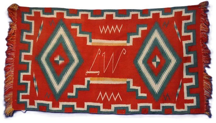 Navajo Germantown runner with initials "LW" in weaving