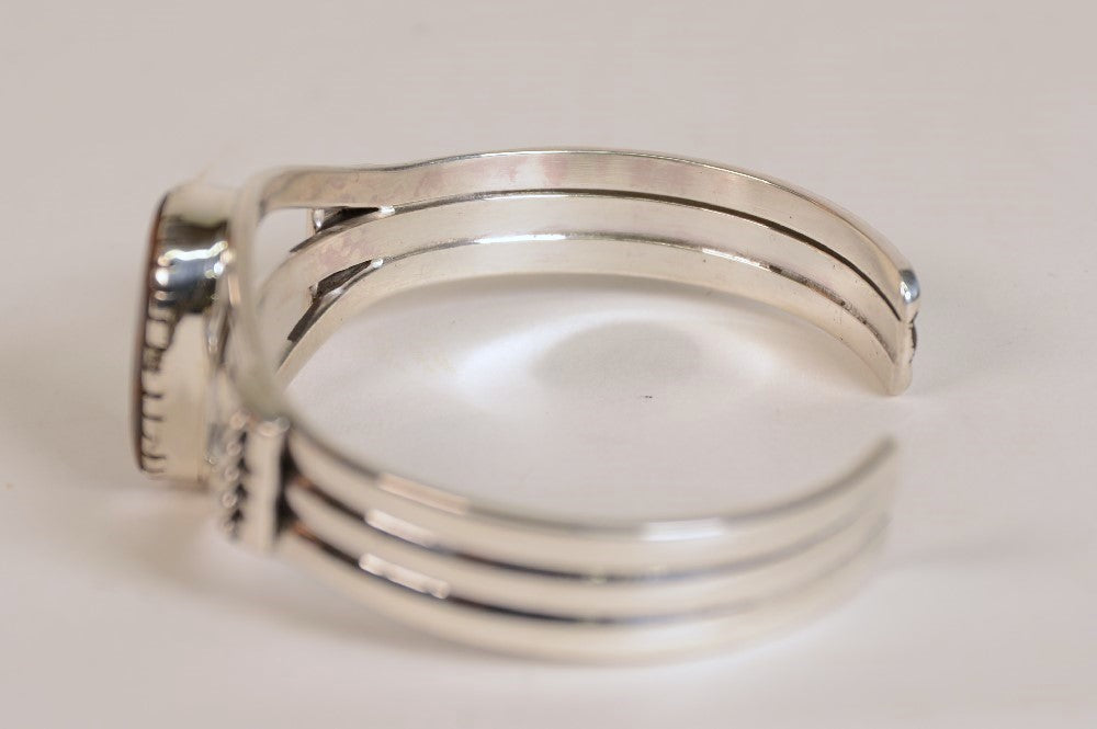 Navajo Bracelet with natural boulder opal setting by Delbert Vandeveer