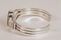 Navajo Bracelet with natural boulder opal setting by Delbert Vandeveer