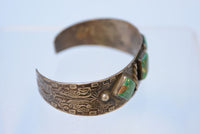 Early Navajo bracelet with early square cut turquoise settings