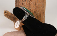An Early Navajo ring; Fred Harvey style