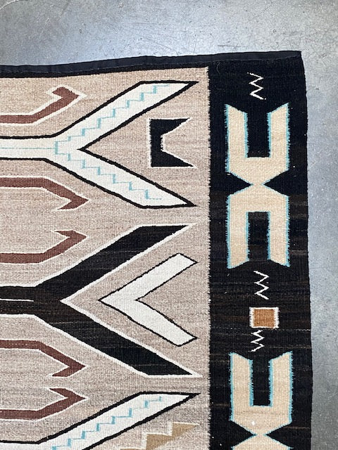 An Early Navajo Rug, Teec Nos Pos with a Reduced End