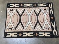 An Early Navajo Rug, Teec Nos Pos with a Reduced End