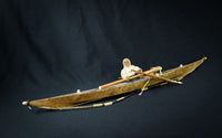 Antique Greenland Inuit Kayak with figure and implements