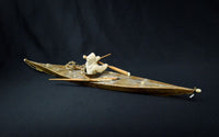 Antique Greenland Inuit Kayak with figure and implements