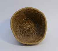 Quinault Twined basket with raffia coiled rim finish;