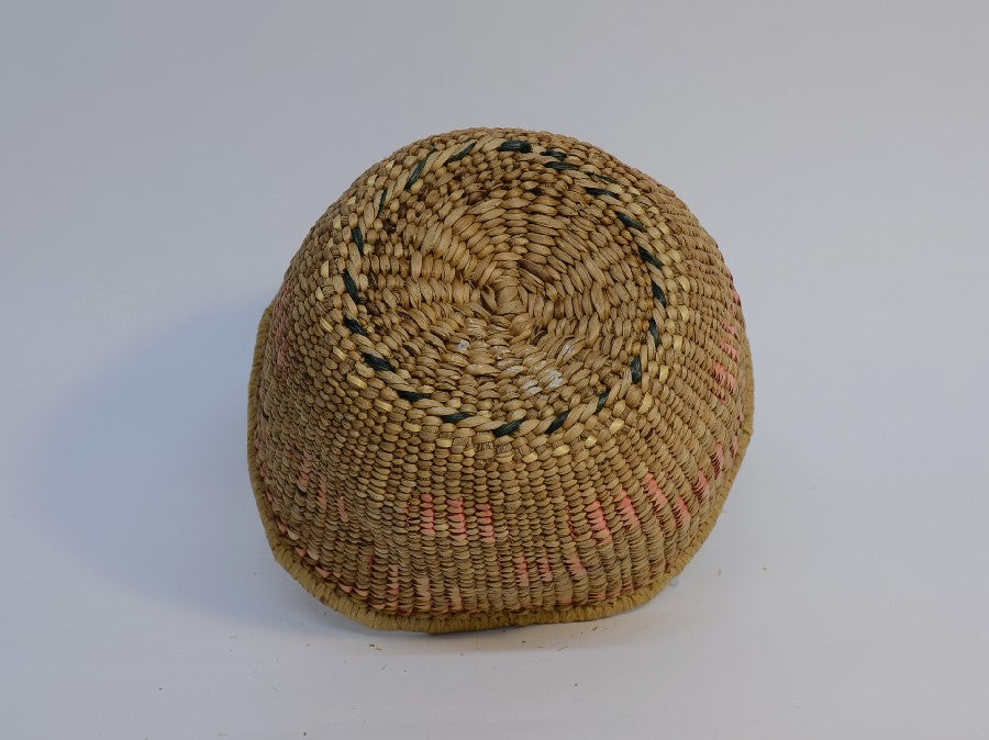 Quinault Twined basket with raffia coiled rim finish;