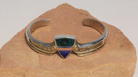 Navajo multi colored gem stone inlaid Bracelet by Ray Tracey 5" length + 1" gap