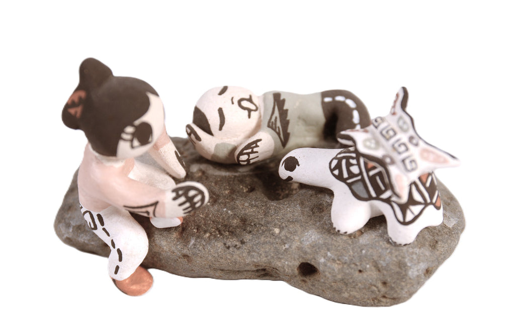 Acoma Pueblo 4 Figures Pottery on a Rock By Aggie