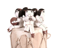 Cochiti Pueblo Storyteller Pottery Dolls on a Drum By Vangie Suina