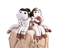 Cochiti Pueblo Storyteller Pottery Dolls on a Drum By Vangie Suina