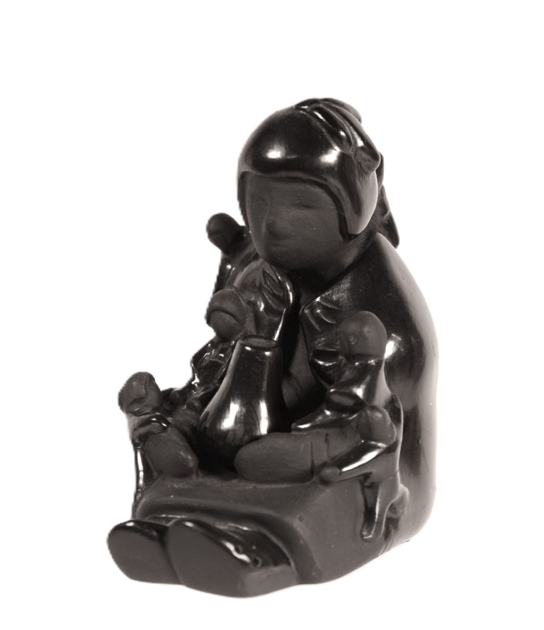 Santa Clara Pueblo Black Storyteller Pottery Doll By Jo Povi