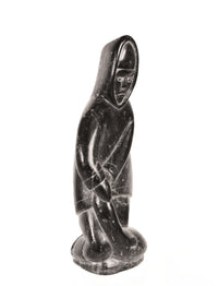 Eskimo Steatite Man with Seal Sculpture