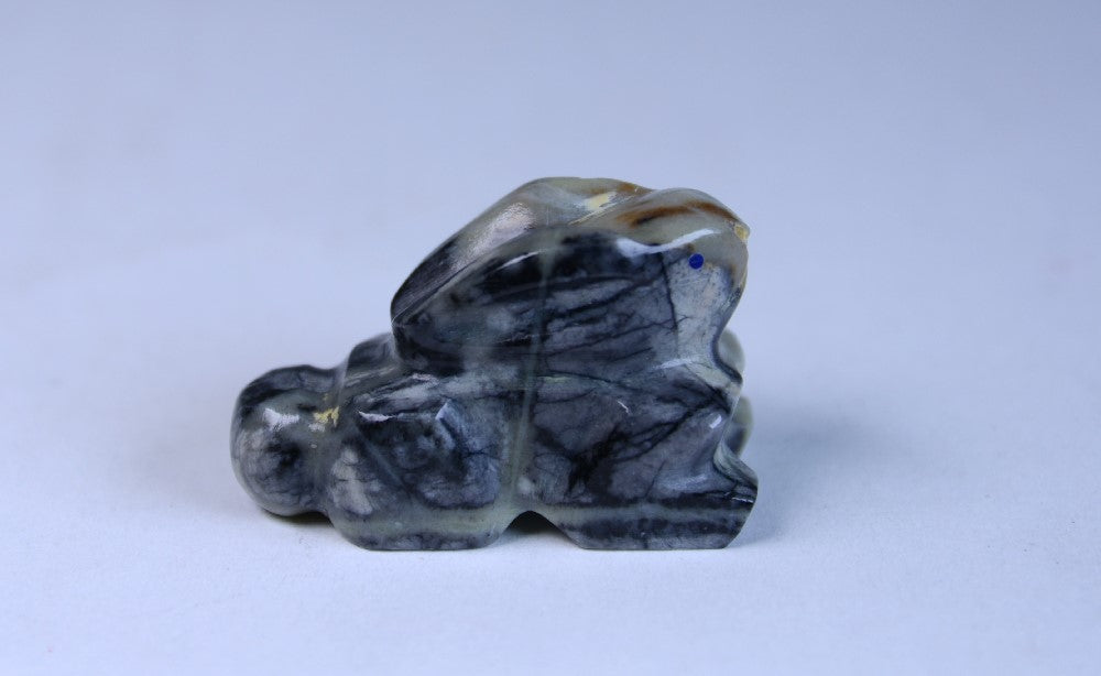 Zuni Rabbit Fetish carved from  Picasso Marble signed by Travis Nieto