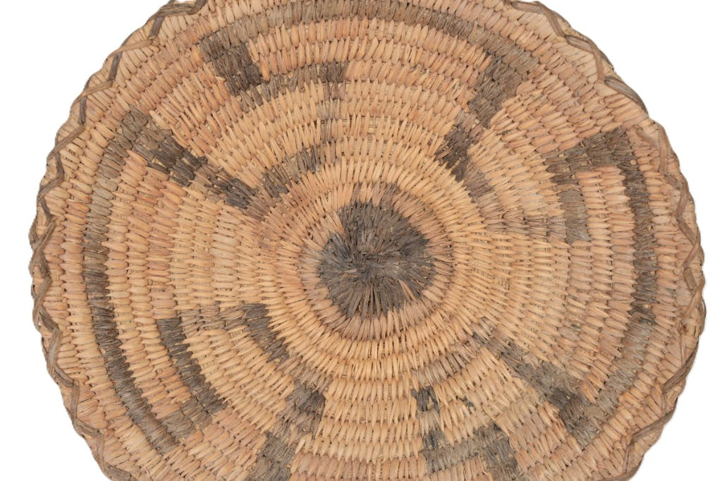 An Early Pima Winnowing Basket with whirlwind motif