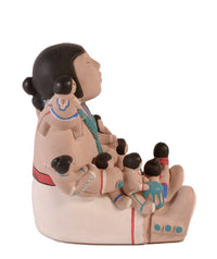 Non-Native Commercial Molded Plaster Storyteller Doll