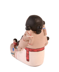 Non-Native Commercial Molded Plaster Storyteller Doll