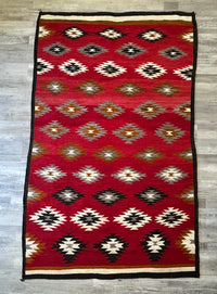 An Early Navajo Rug, Ganado Red