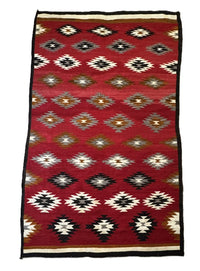 An Early Navajo Rug, Ganado Red
