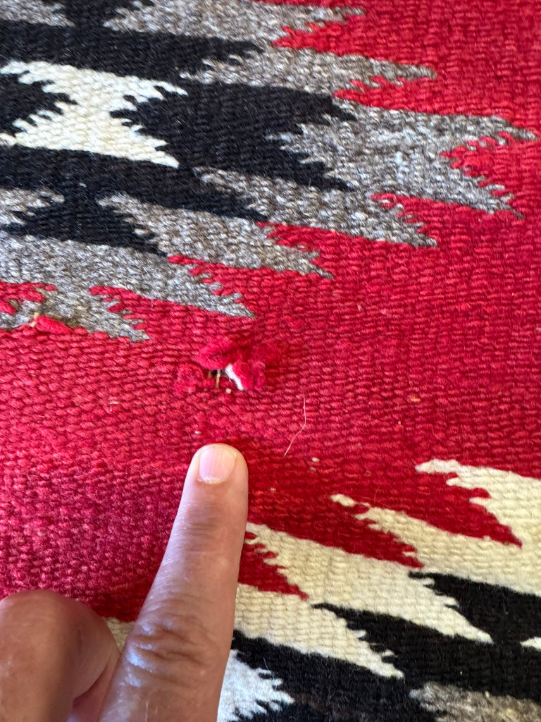 An Early Navajo Rug, Ganado Red