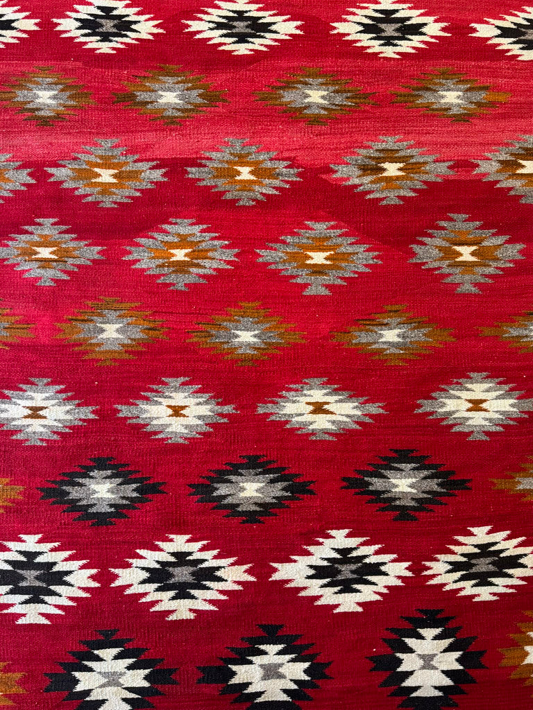 An Early Navajo Rug, Ganado Red