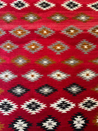 An Early Navajo Rug, Ganado Red