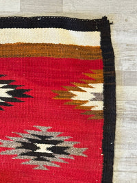 An Early Navajo Rug, Ganado Red
