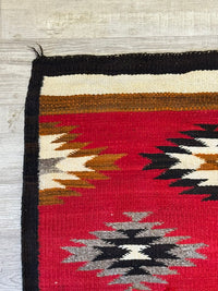 An Early Navajo Rug, Ganado Red