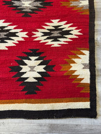 An Early Navajo Rug, Ganado Red
