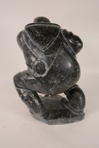 Large Inuit Steatite Soapstone Man with Hiding Seal Sculpture  Peter Juanista