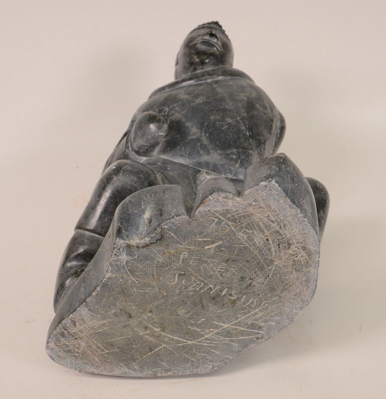 Large Inuit Steatite Soapstone Man with Hiding Seal Sculpture  Peter Juanista