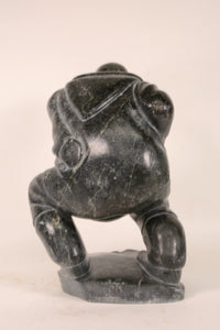 Large Inuit Steatite Soapstone Man with Hiding Seal Sculpture  Peter Juanista