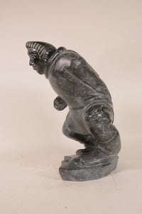 Large Inuit Steatite Soapstone Man with Hiding Seal Sculpture  Peter Juanista