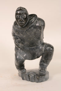 Large Inuit Steatite Soapstone Man with Hiding Seal Sculpture  Peter Juanista