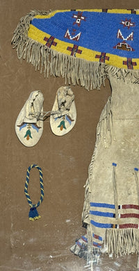 Antique Beaded Hide Sioux Girls Dress in Frame with other small beaded items