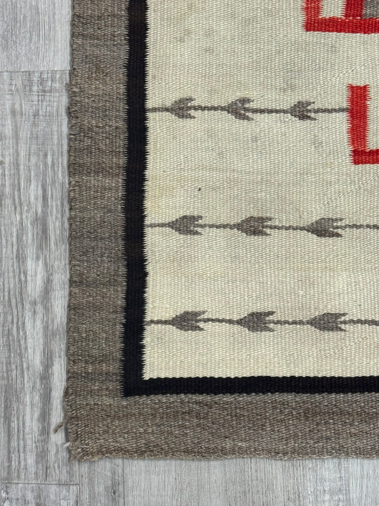 An Early Navajo Klagatoh Rug with Corn Plant Motif Banding