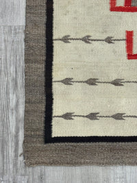 An Early Navajo Klagatoh Rug with Corn Plant Motif Banding