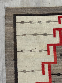 An Early Navajo Klagatoh Rug with Corn Plant Motif Banding