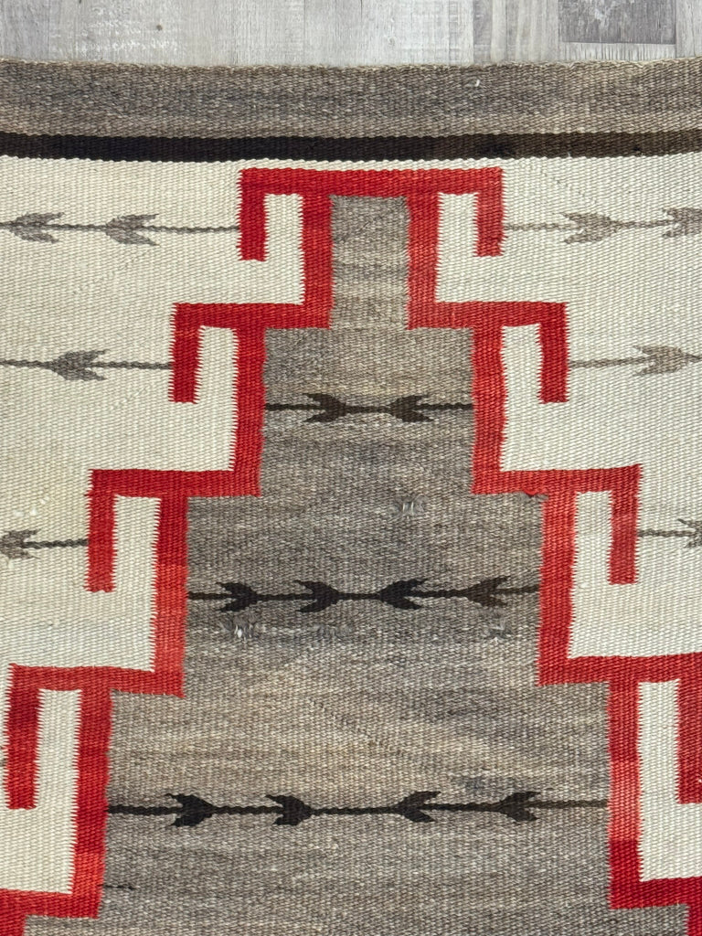 An Early Navajo Klagatoh Rug with Corn Plant Motif Banding