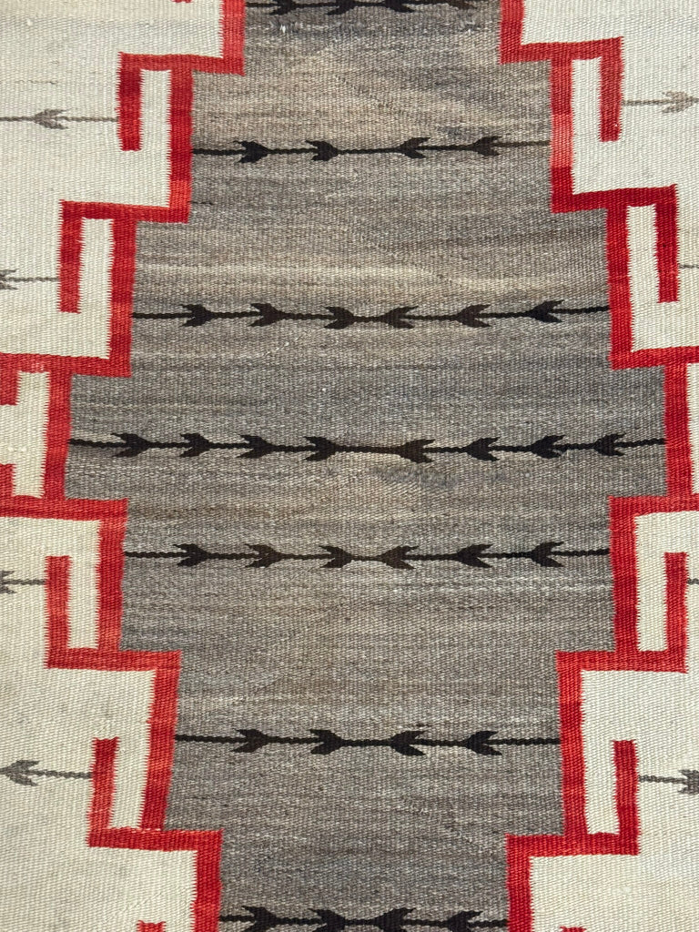 An Early Navajo Klagatoh Rug with Corn Plant Motif Banding