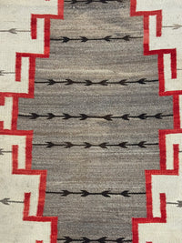 An Early Navajo Klagatoh Rug with Corn Plant Motif Banding